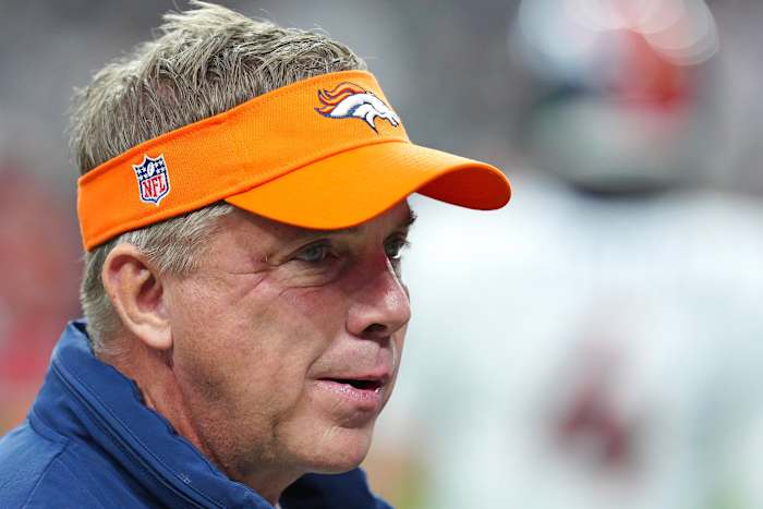 Denver Broncos head coach Sean Payton walks on the field before the start of a game against the Las Vegas Raiders at Allegiant Stadium.